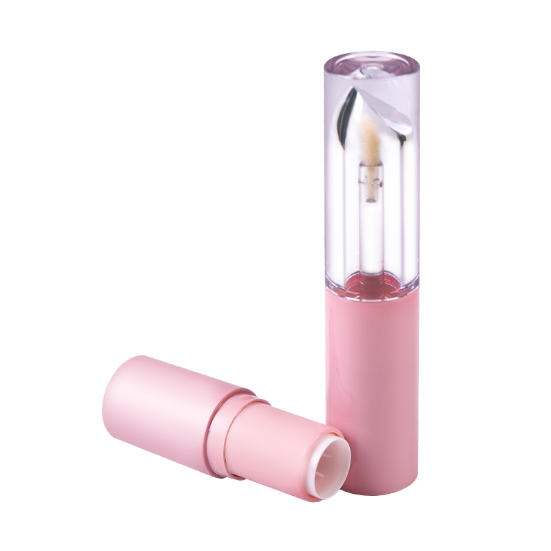 Tubo de lápiz labial y brillo labial monobloque rosa con empaque cosmético integrado