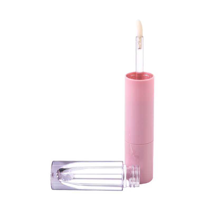 Tubo de lápiz labial y brillo labial monobloque rosa con empaque cosmético integrado